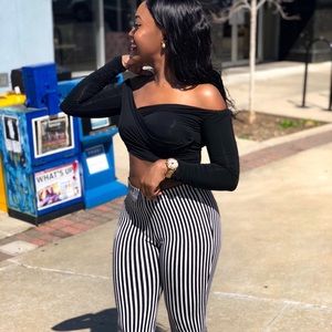 Black and white striped flare pants